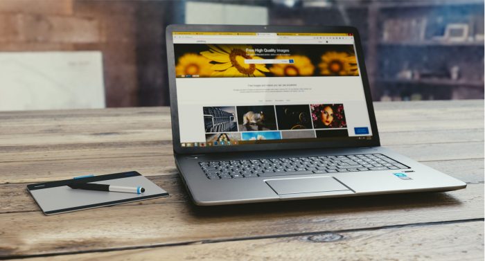gray laptop computer with UX Agency website